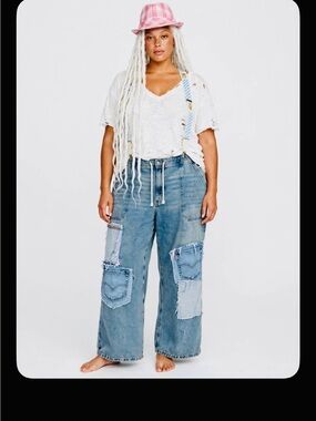 CRAM wide leg jeans with suspenders.